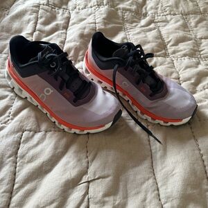 On Running Shoes in Black and Orange